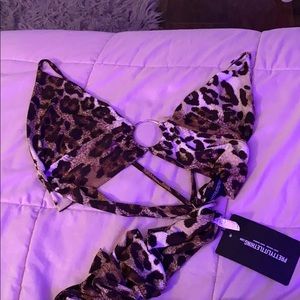Leopard plunge ring top
